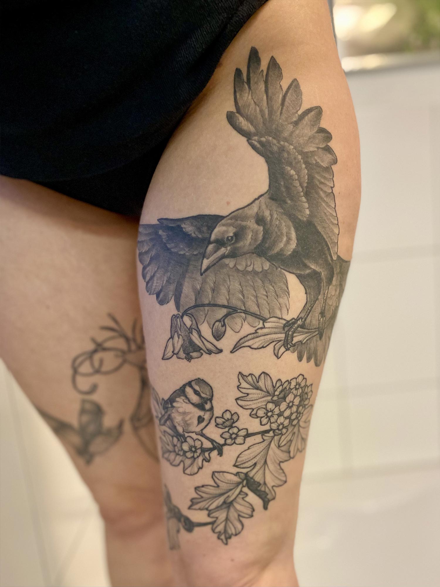 Maries Oberschenkel-Tattoo